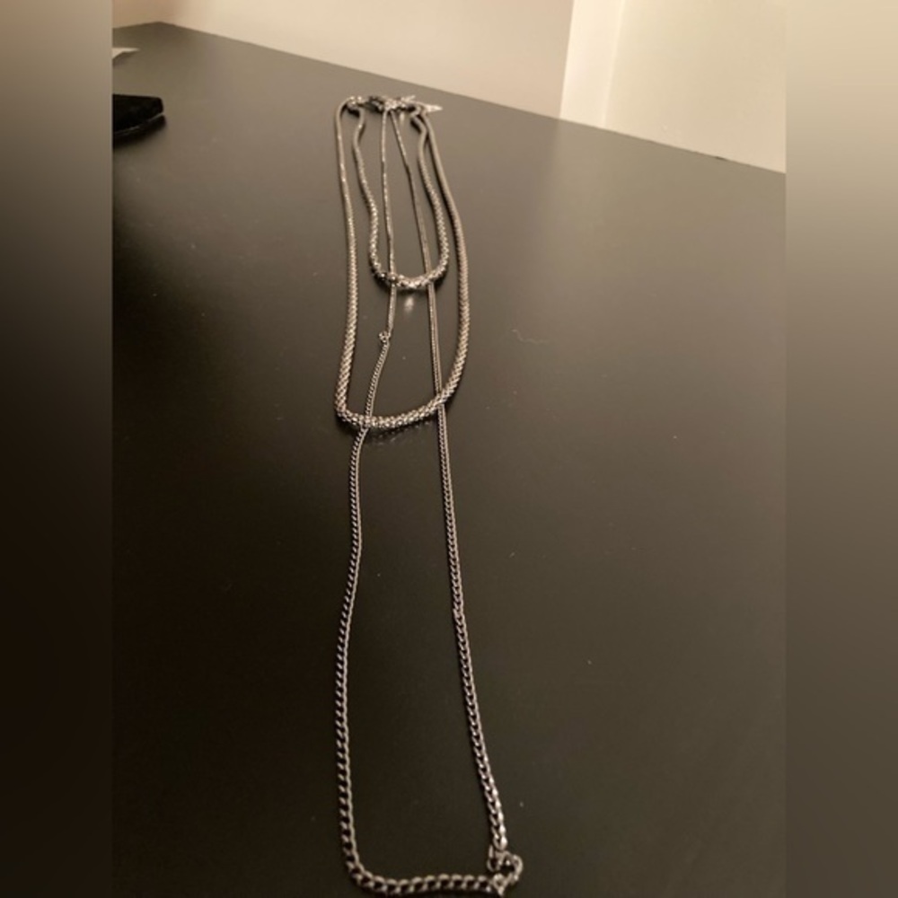 Very long multi-strand silver tone chain necklace